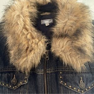 Cool jean jacket with faux fur trim.